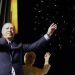 Presiden Turki Recep Tayyip Erdogan dan istri, Emine menyapa pendukung Partai AKP di Ankara, Turki. Ia menjadi presiden untuk ketiga kalinya. (AP)