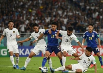 Ilustrasi Timnas Indonesia melawan Jepang. (Dok. Generate by AI)